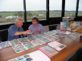 Ton de Jong (??) showing Stephan Dunweg printed pages and a mock-up of the cover.